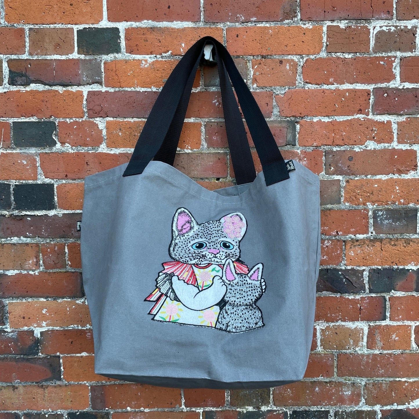 Grey canvas with embroidered and beaded cat